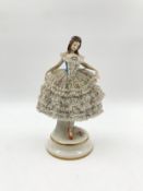 A 19th century Rudolstadt Volkstedt porcelain figure, marked to base. H.22cm