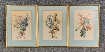 A set of three wild flower prints, notes to the reverse, framed and glazed. H.36 W.26cm (each)