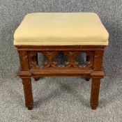 A late 19th century carved oak Gothic revival stool. H.50 W.45 D.36cm