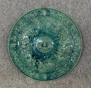 A large 19th century majolica turquoise glazed charger with classically themed decoration,