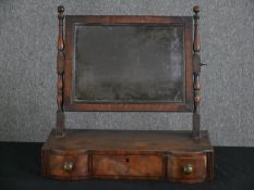A 19th century mahogany swing toilet mirror with original plate. H.48 W.49 D.28cm.