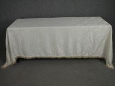 A large early 20th century damask table cloth. L.250 W.164cm.