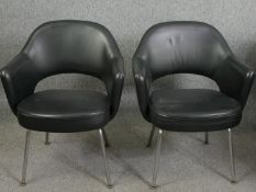 A pair of vintage Eero Saarinen director's conference chairs in original upholstery on chrome