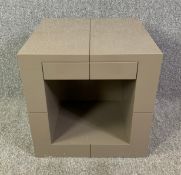 A contemporary lacquered side table with frieze drawer. H.50 W.50 D.50cm