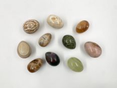 A collection of ten pieces of specimen stone modelled as eggs. H.7cm (largest)