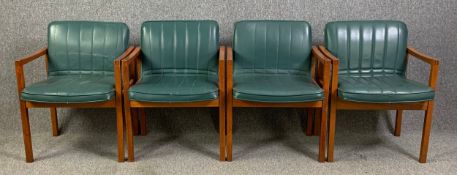 A set of four vintage lounge armchairs in leather upholstery. H.75 W.56 D.55cm (each)