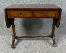 A 19th century style burr walnut sofa table. H.51 W.62 (108 extended) D.41cm