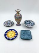A collection of majolica and other ceramic dishes and an enamelled copper vase. H.14cm (largest)