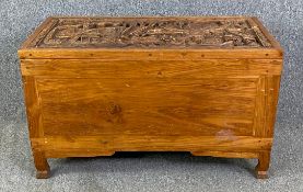 An Eastern carved hardwood coffer. H.62 W.107 D.56cm