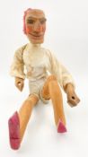 A carved and jointed Mr Punch doll. H.63cm