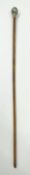 A ball headed swagger stick with Royal Inniskilling Fusiliers crest. L.68cm