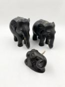 Three carved ebony elephants. H.16cm (largest)
