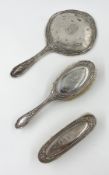 A 19th century silver dressing table set, monogrammed and with Birmingham hallmarks. H.31cm (