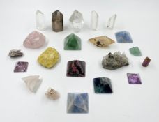 A miscellaneous collection of specimen stones to include cut crystal and amethyst and fluorite