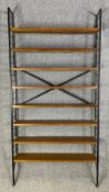 A Staples Ladderax teak mid-century wall bookshelf system. H.217 W.109 D.21cm