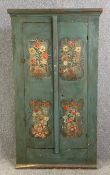 A continental pine hall cupboard or wardrobe with hand painted floral decoration. H.168 W.95 D.23cm