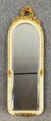 A mid century painted dressing mirror with gilt ribbon cresting. H.92 W.32cm