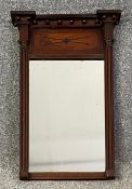 A 19th century Empire style mahogany pier mirror. H.62 W.42cm