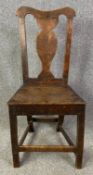 A Georgian elm splat back hall chair. H.101cm