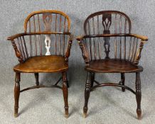 18th century Windsor wheelback armchairs, a near pair with elm seats and crinoline stretchers. H.