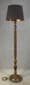A vintage oak barleytwist standard lamp. H.214cm