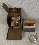 A Revere model 80 8mm projector and a Richard veriscope. H.37 W.27 D.20cm (largest)