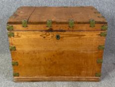 A 19th century pine and metal bound trunk. H.55 W.75 D.53cm