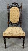 A Victorian carved rosewood side chair. H.97 W.45 D.43cm