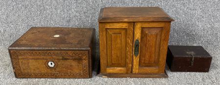 Three 19th century boxes; Tunbridgeware inlaid, an oak fitted cabinet and an oak box fitted for coin