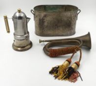A miscellaneous collection of metalware, coffee maker, silver plated wine cooler and a bugle. W.35cm