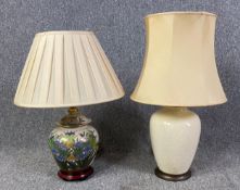 Two Oriental style baluster form ceramic table lamps with shades. H.63cm (largest)