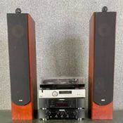 A pair of B&W speakers along with a Pro-Ject turntable and Marantz and Arcam Hi-Fi amps. H.101cm (