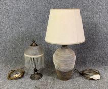 A Victorian style table lamp with glass shade and a baluster form stoneware table lamp. H.57cm (