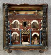 A cased folk art style model of a 19th century house. (Front glass panel missing). H.75 W.64 D.37cm