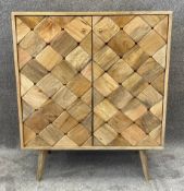 A contemporary retro styled teak cabinet. H.90 W.75 D.49cm