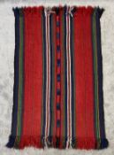 A Jordan River foundation hand woven woollen carpet with label to the reverse. L.205 W.123cm