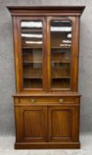 A 19th century mahogany two section library bookcase. H.212 W.106 D.44cm