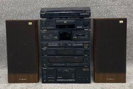 A Technics hi-fi system to include turntable and Technics Ex Series speakers. H.51 W.36 D.32 (