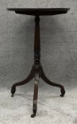 A Georgian mahogany tilt top occasional or lamp table. H.80 Dia.51cm