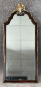 A pair of Georgian style wall mirrors with gilt shell cresting. H.72cm (each)