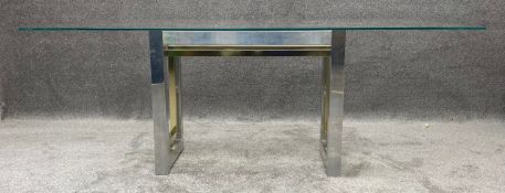 A 1970's vintage Romeo Rega dining table in brass and chrome. H.74 W.198 D.110cm