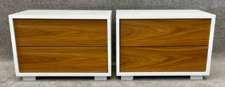 A pair of contemporary bedside tables with teak drawers by Gervasoni, Italy. H.42 W.60 D.40cm (