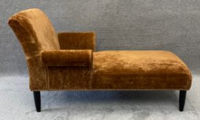 A contemporary day bed in studded velour upholstery. H.86 W.154 D.93cm