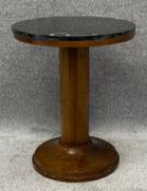 An Art Deco style pedestal table with a black marble top. H.62 W.50cm
