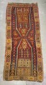 A hand knotted polychrome flatweave Kelim runner. L.370 W.140cm