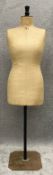 A vintage dress maker's dummy on a metal stand. H.164cm
