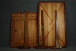 Two hardwood draughtsmans boards with associated set squares. H.81 W.139. (largest).