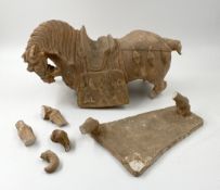 A plaster replica Chinese Tang horse. Damaged but complete. L.44cm