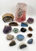 A collection of geodes and crystals to include a large piece of volcanic glass (ancient formation)