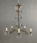 A vintage five branch bronze and brass chandelier with crystal drops. H.76cm